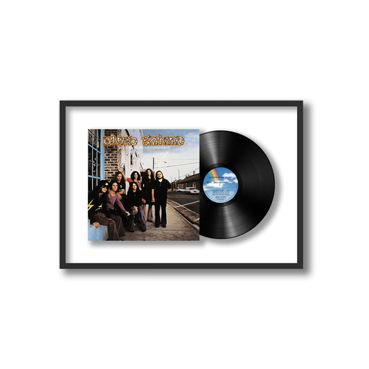(Pronounced 'Lĕh-'nérd 'Skin-'nérd) { vinyl }